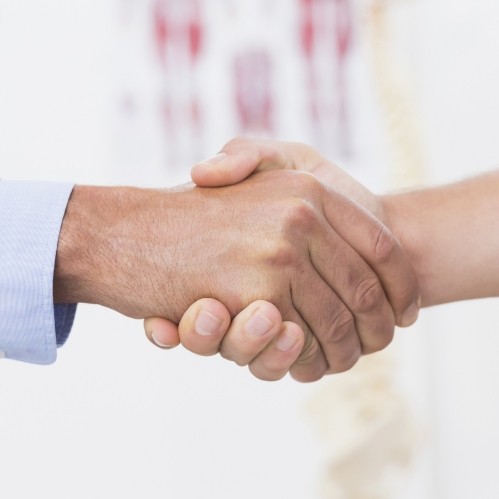 Two people shaking hands