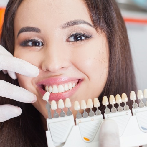 Young woman being fitted for veneers by Carrollton cosmetic dentist